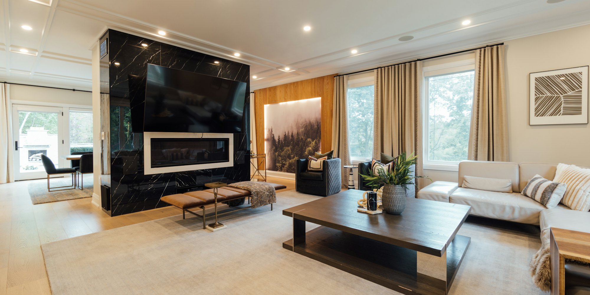 A Pravasth interior — living space with warm timber and stone finishes